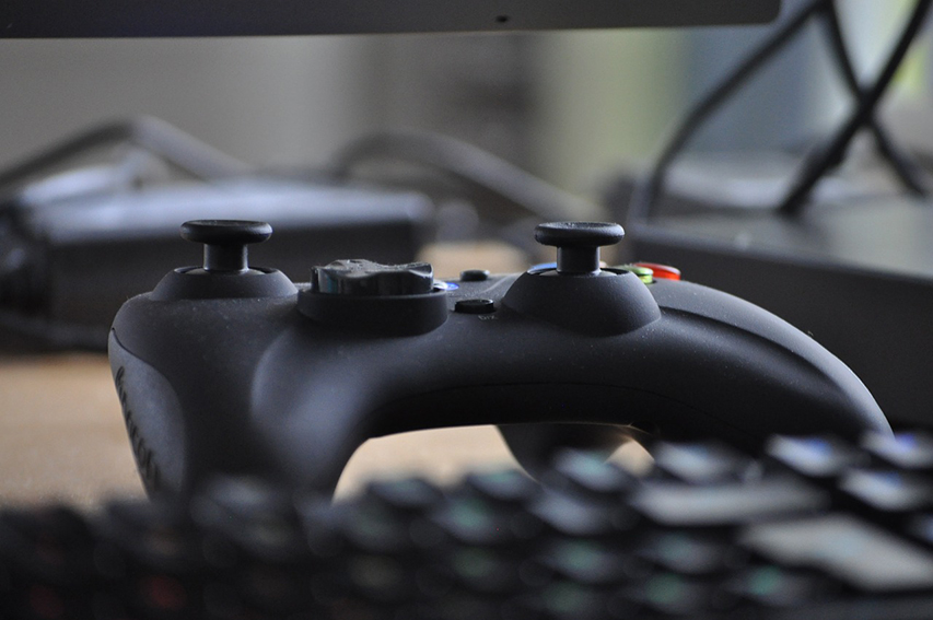 An image of a black video game controller.